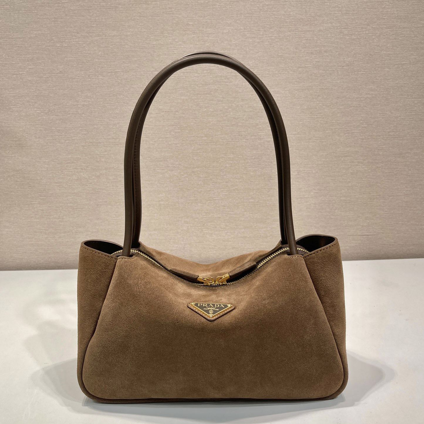 Pra*a top handle bags